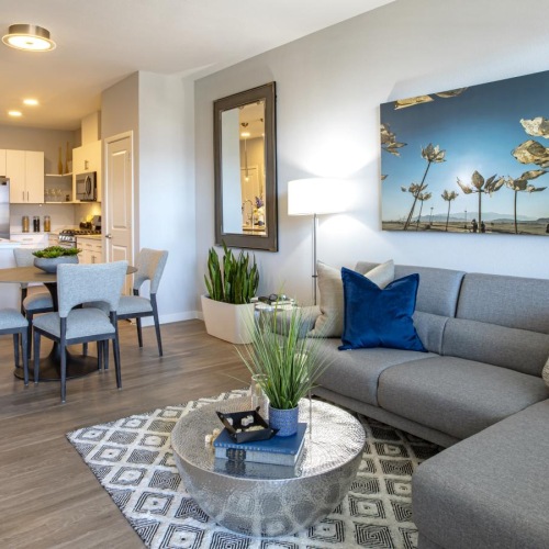 a living room with a couch and a table